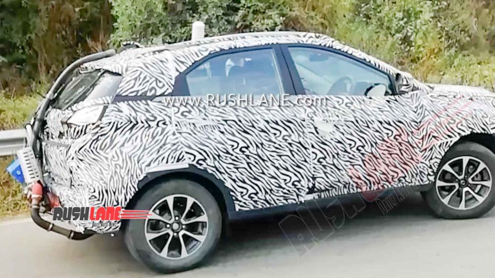 Tata Nexon was spotted on the streets of India and despite heavy camouflage, it was spotted with an emission kit akin to a BS6 engine. Credit-Rushlane.com