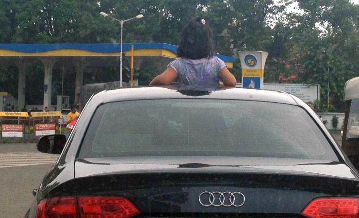 Children sticking out of the sunroofs | Child safe cars