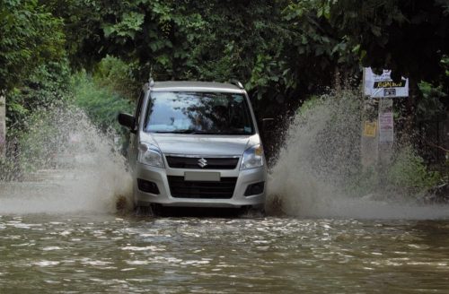 WagonR driving through water